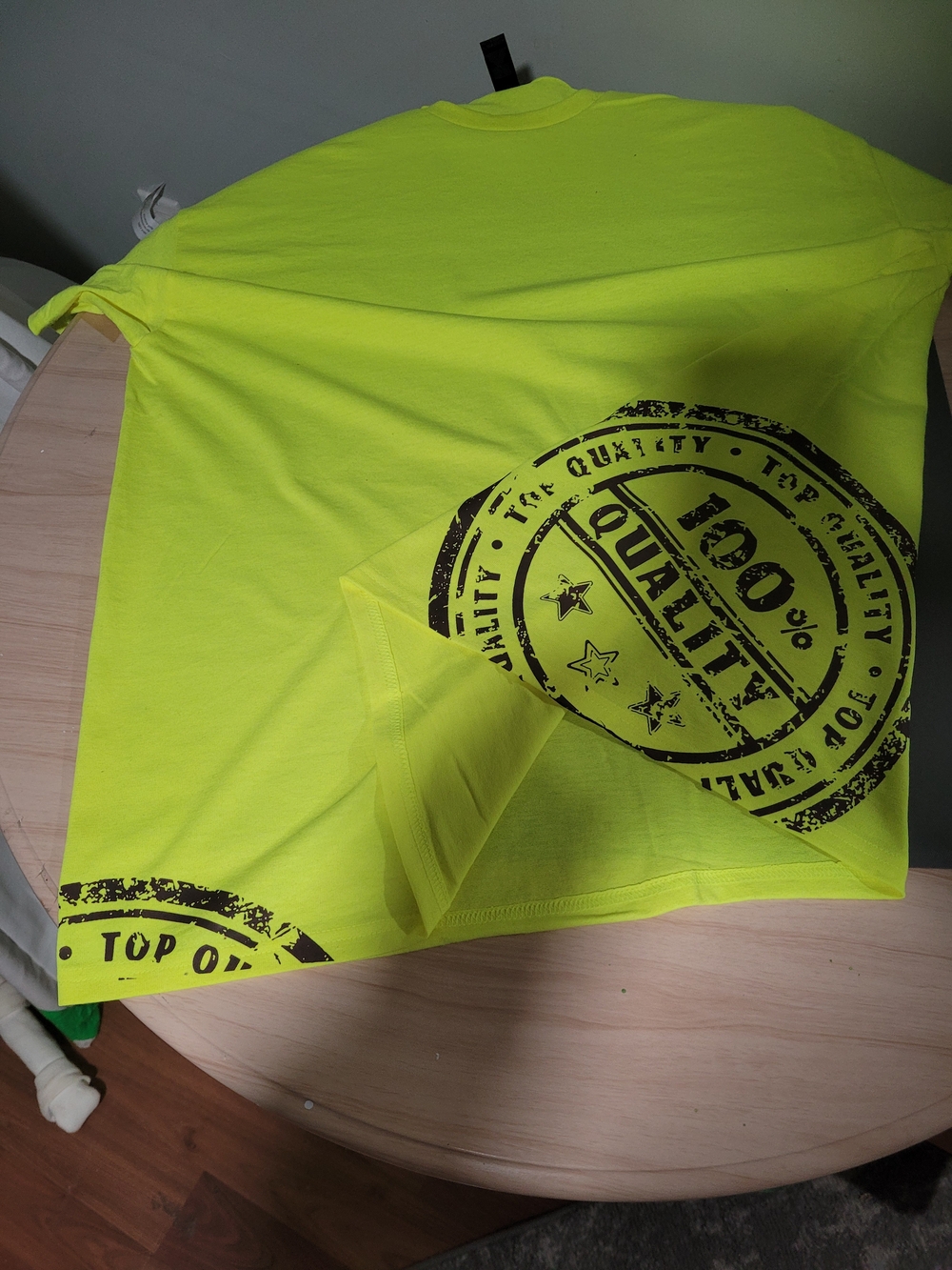 High-Vis Yellow Graphic Tee with Black '100% Quality' Stamp
